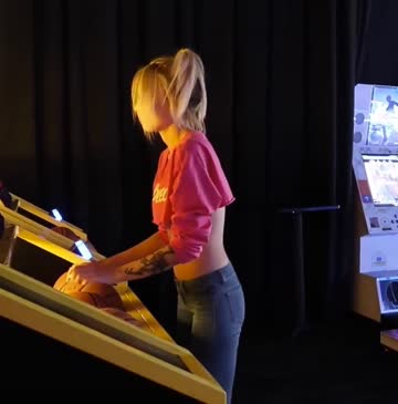 shooting hoops in a crop top