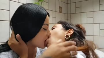 brunette girls passionate kissing