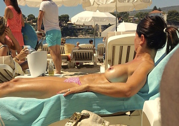me, french mom tanning topless on the riviera, wedding ring showing ;-)