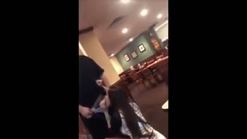 a waiter gets a blowjob inside of a restaurant