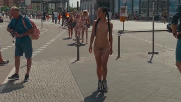 showing off her tattoos to the whole city