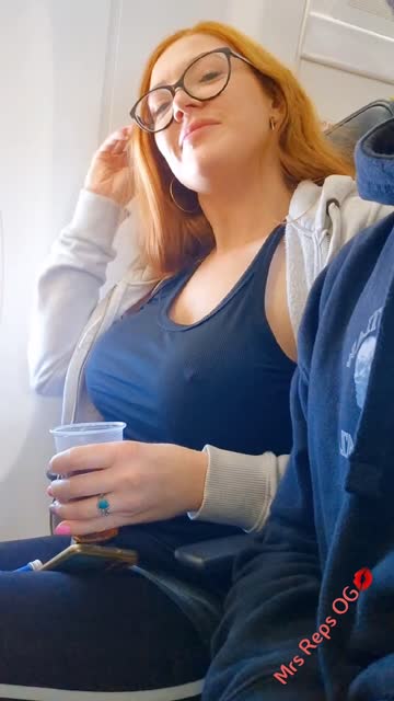 public milf big tits cute flashing redhead airplane nsfw video