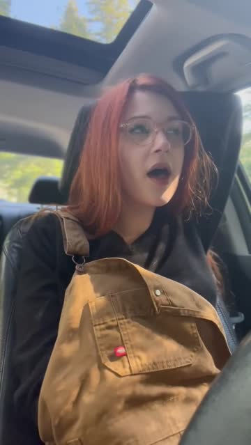 clothed redhead glasses public 